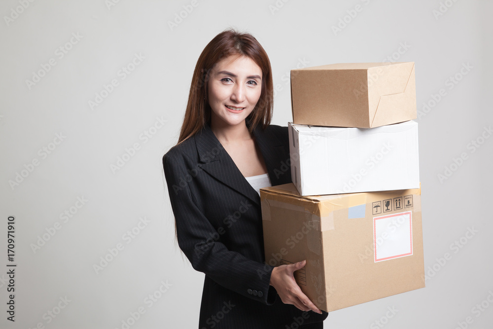 Young Asian working woman with 3 shipping boxes Young Asian working woman with 3 shipping boxes