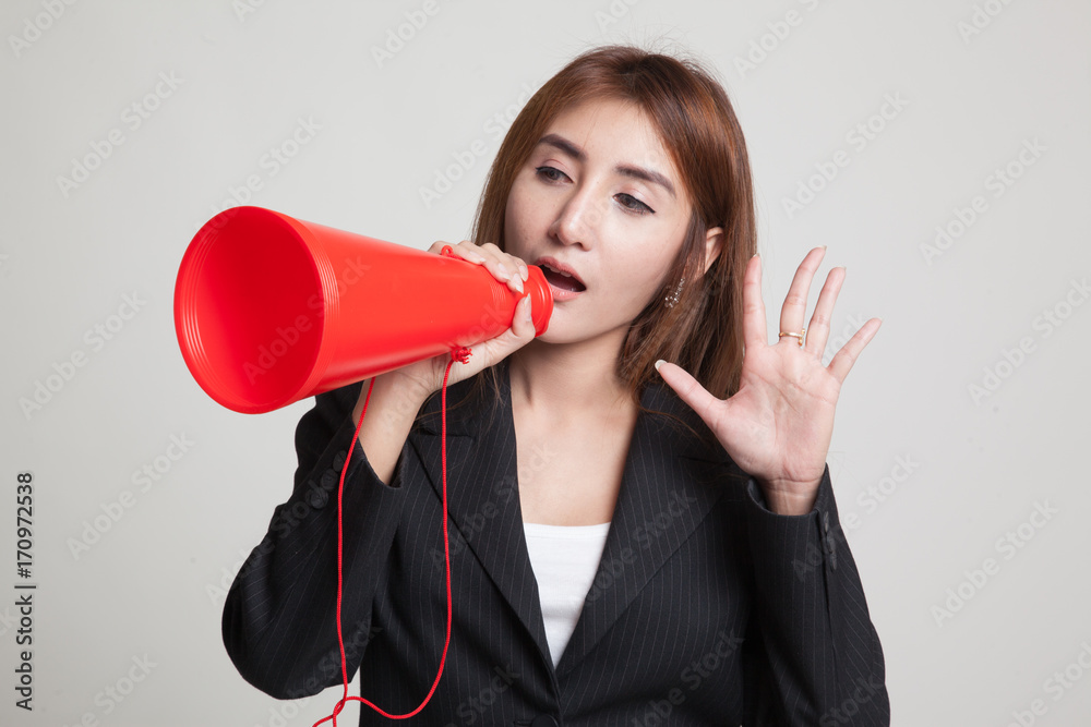 Beautiful young Asian woman announce with megaphone. Beautiful young Asian woman announce with megaphone.
