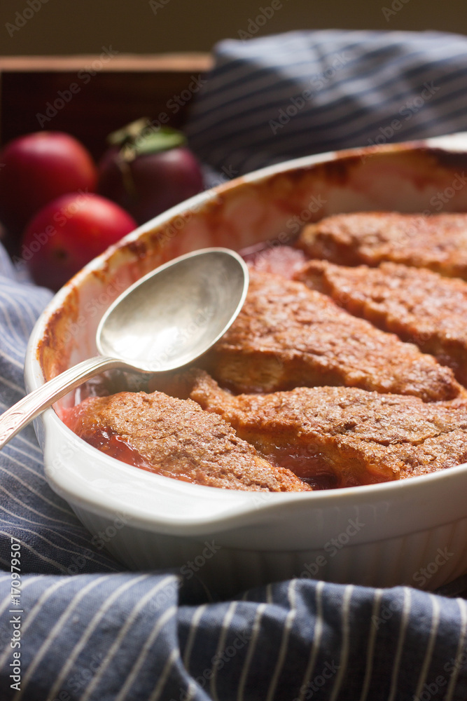 Cobbler with fruit filling, rustic style, selective focus Cobbler with fruit filling, rustic style, selective focus
