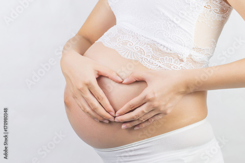 Wallpaper Mural Close up of a cute pregnant belly Torontodigital.ca