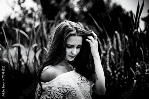 Portrait of a girl in a field, fine art, black and white photos