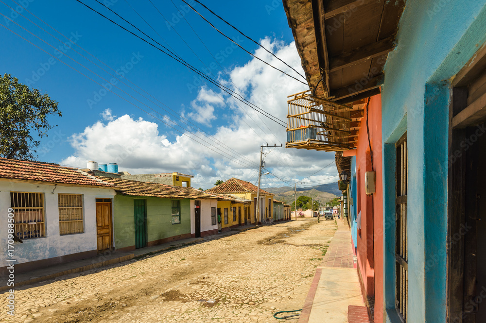 Colorful houses on the cobblestone streets in the UNESCO World Heritage city center of Trinidad Cuba.