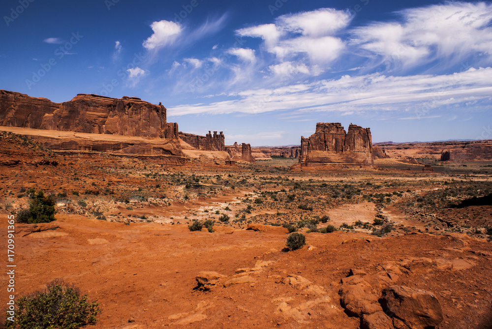 The Wide Open West as Sandstone Monuments Tower Over The Desert in Arches National Park The Wide Open West as Sandstone Monuments Tower Over The Desert in Arches National Park