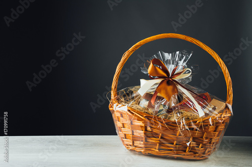 Foto gift basket on gray background