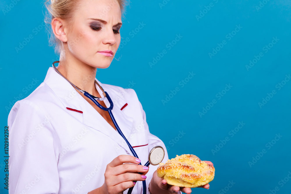 dietitian examine sweet roll bun with stethoscope dietitian examine sweet roll bun with stethoscope