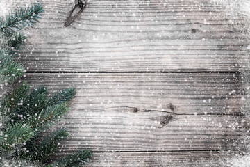 Christmas background - fir tree decorating rustic elements on vintage wood table with snowflake. Creative Flat layout and top view composition with border and copy space design.