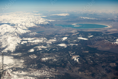 flying over california mountains in spring