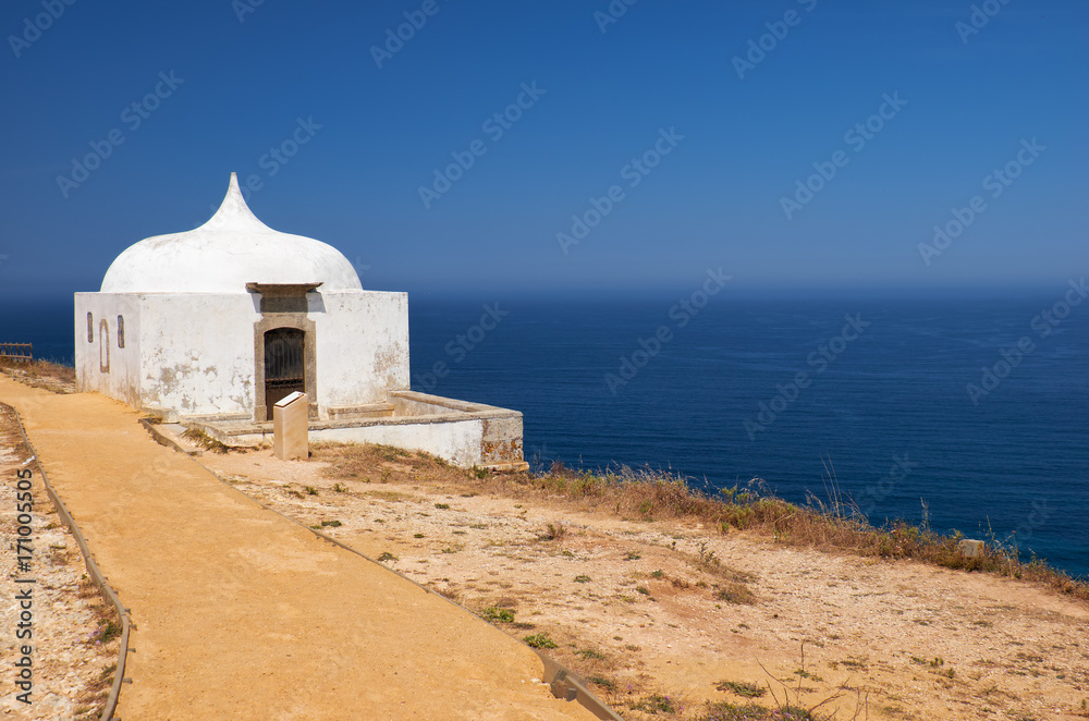 Path near Ermida da Memoria or Memory Chapel of Nossa Senhora do Cabo Church near cape Espichel, Portugal Path near Ermida da Memoria or Memory Chapel of Nossa Senhora do Cabo Church near cape Espichel, Portugal