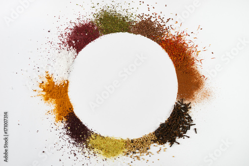 Fototapeta Naklejka Na Ścianę i Meble -  Circle frame composition of spices and herbs isolated on white
