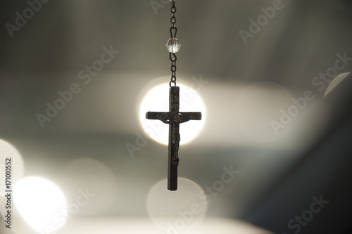 Crucifix in center of spotlight