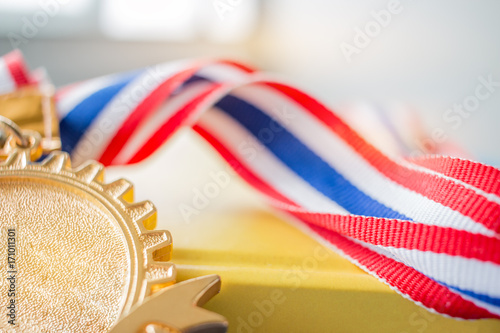 Golden medals on book, graduate education in university, Competitions and Education study concepts. Success in study famous institution, Concept of winner abroad international. photo