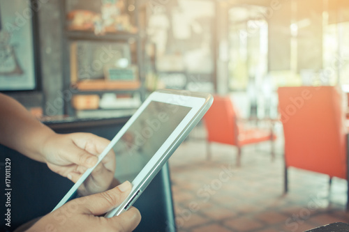 Hipster woman holds tablet sync app  Using Online banking payment by network internet wireless development mobile smartphone for Businessshopping in coffee shop  Internet concept.