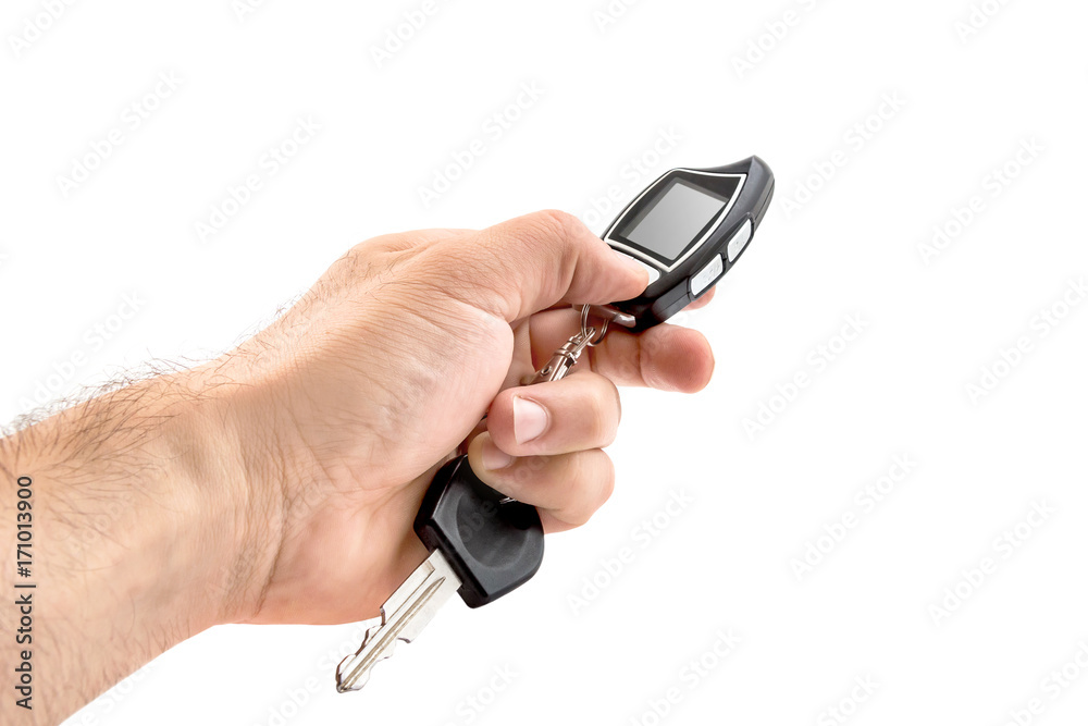 man's hand holding car remote control with screen. Isolated on white. man's hand holding car remote control with screen. Isolated on white.