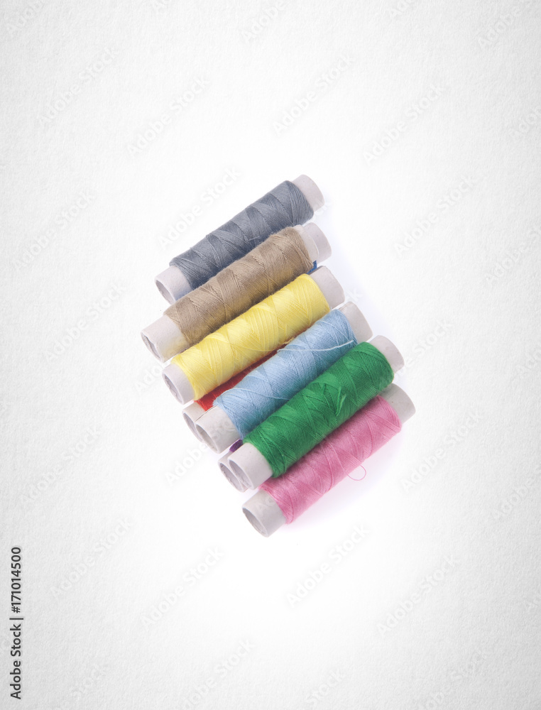 bobbins or bobbins of thread on a background. bobbins or bobbins of thread on a background.