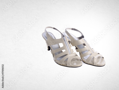 shoe or white color lady shoes on a background.