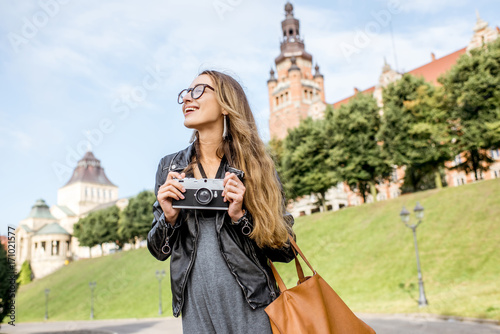Portrait of a young woman tourist on the Haken terrace traveling in Szczecin city in Poland © rh2010