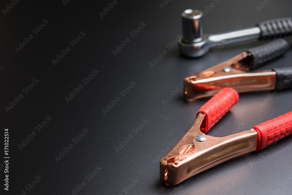 Fototapeta premium Car repair tools on the black background.selective focus.