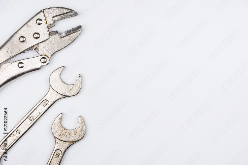 Car repair tools on the white background.selective focus. Car repair tools on the white background.selective focus.