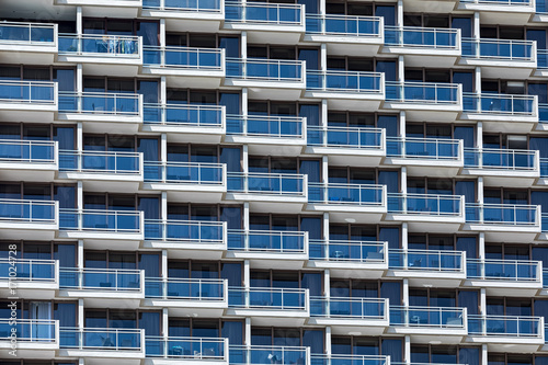 Row of balconies on modern building.