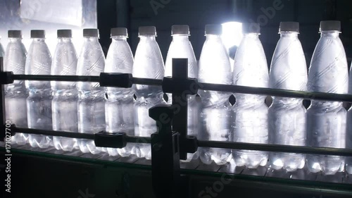 Factory bottled water conveyor photo