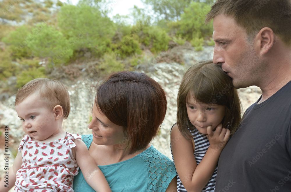 Fototapeta premium Happy family mother, father, child daughter and baby in nature