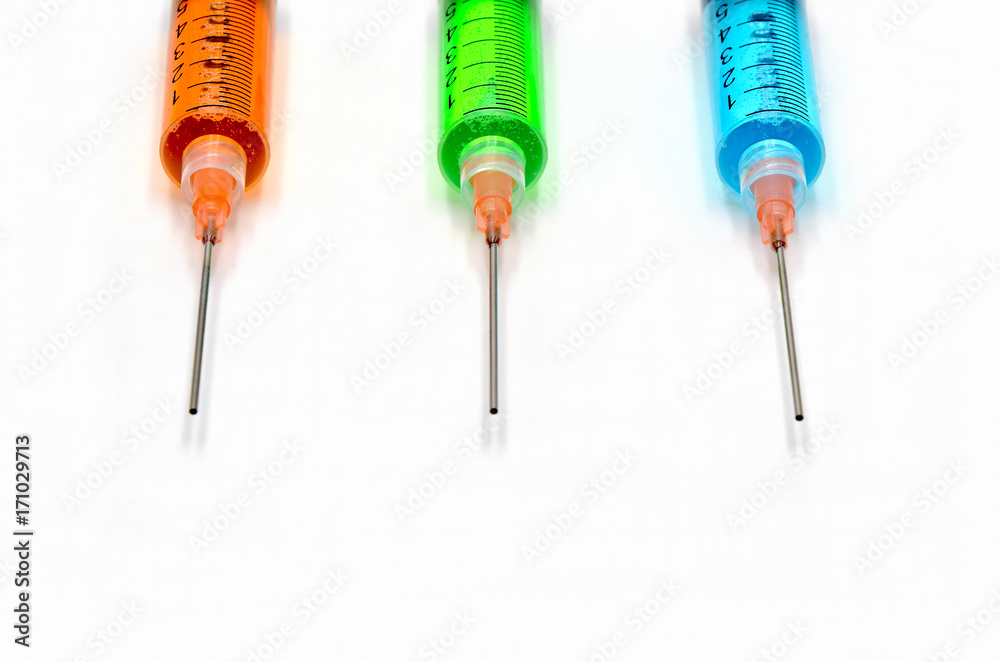 Syringe injection on a white background close up Syringe injection on a white background close up