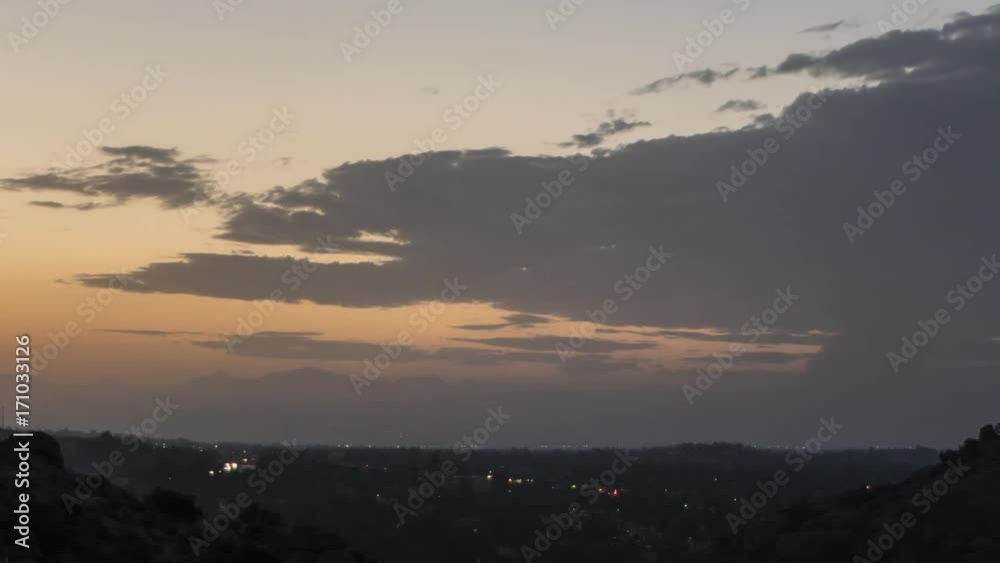 Smoke filled sunrise time lapse with zoom as La Tuna wildfire burns on Verdugo Mountain in Los Angeles, California. Smoke filled sunrise time lapse with zoom as La Tuna wildfire burns on Verdugo Mountain in Los Angeles, California.