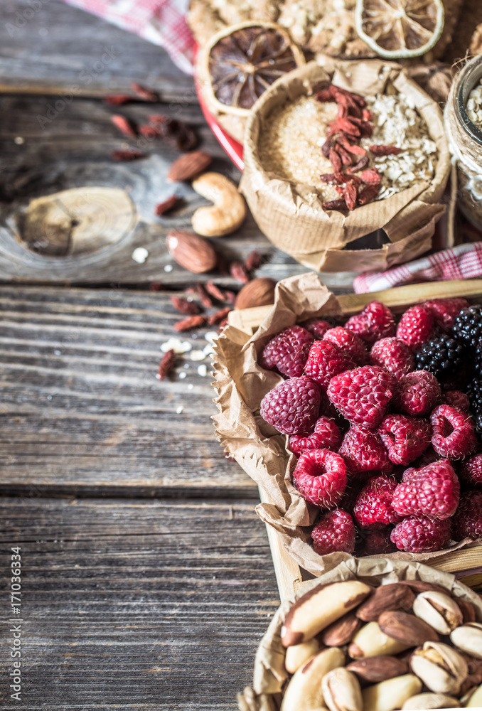 still life with raspberries and nuts