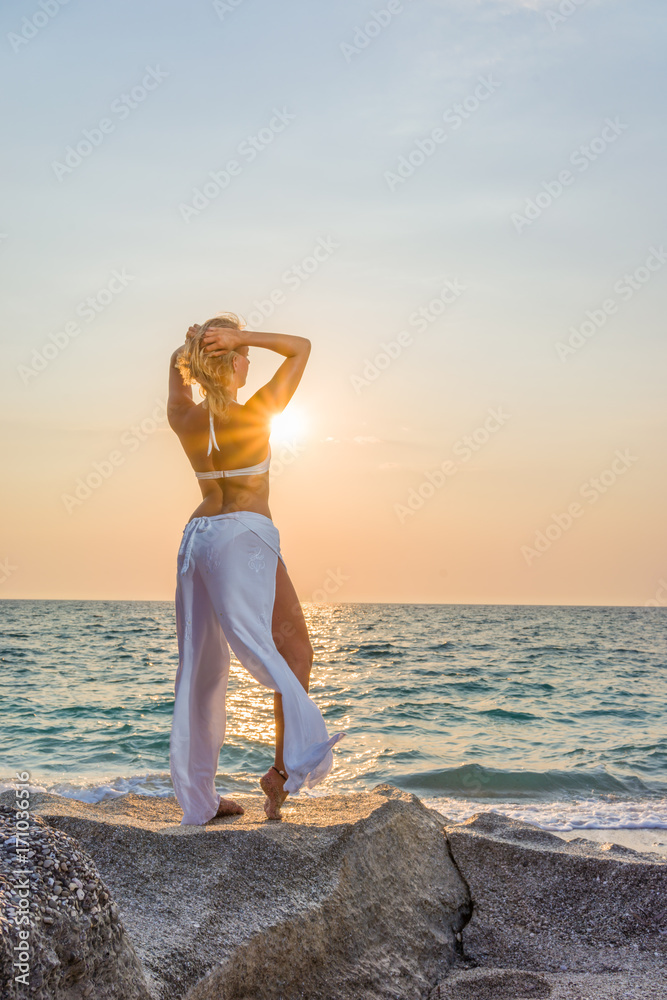 Classy woman on the beach in Greece Classy woman on the beach in Greece