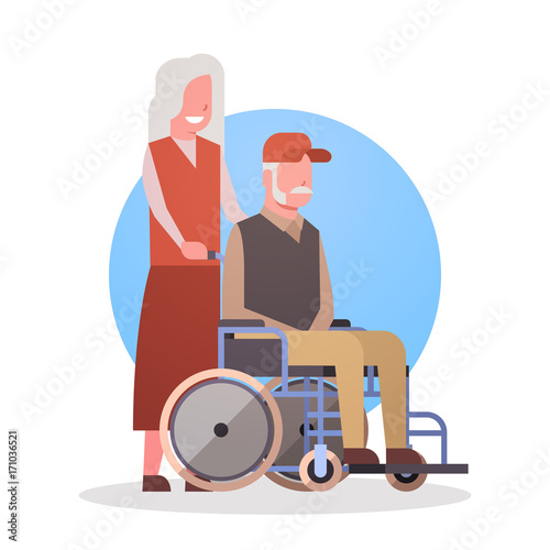 Senior Man On Wheel Chair And Woman