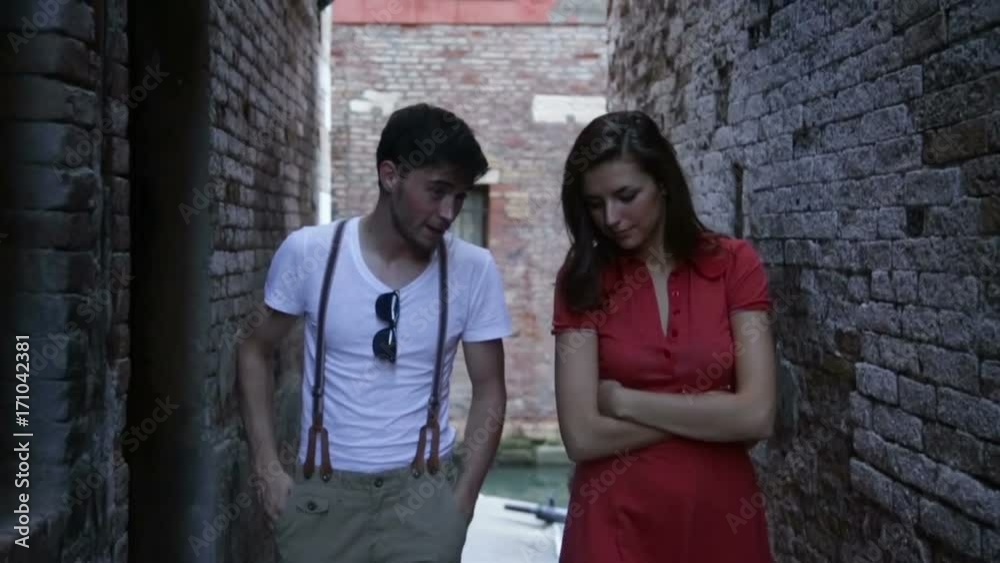 Young girl and boy walking in the narrow streets of Venice Young girl and boy walking in the narrow streets of Venice