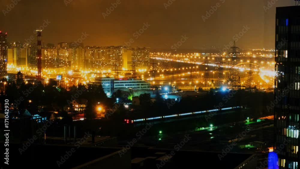Aerial view of city with Traffic on road at night. Timelapse view. Aerial view of city with Traffic on road at night. Timelapse view.