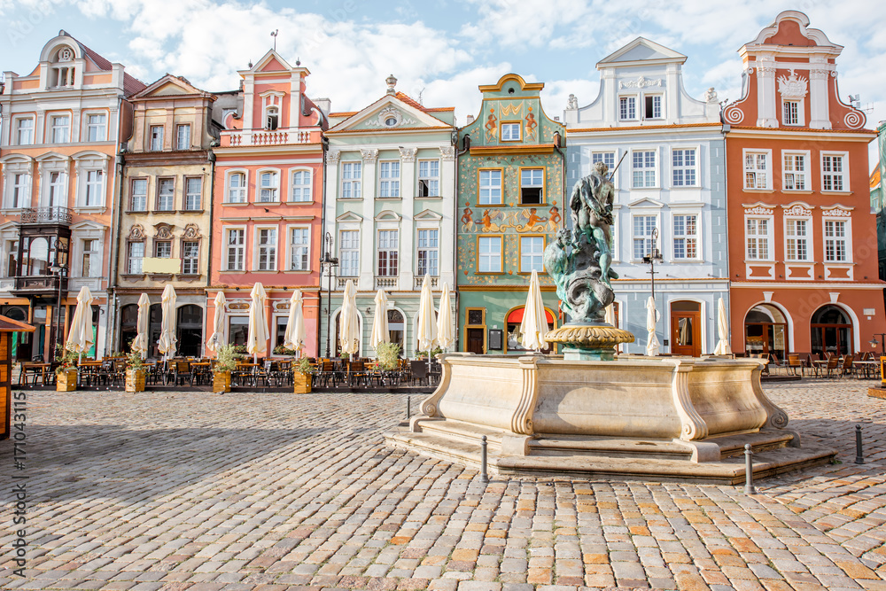 Fototapeta View on the beautiful old buildings with Neptune fountain on the Maket square in Poznan city during the morning light in Poland