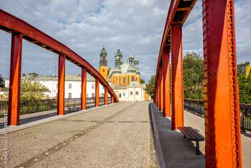 View on the saint Peter and Paul church with old red bridge in Poznan, Poland