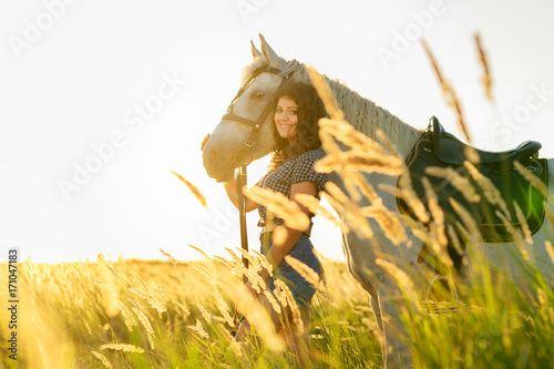 beauty brunette woman with horse
