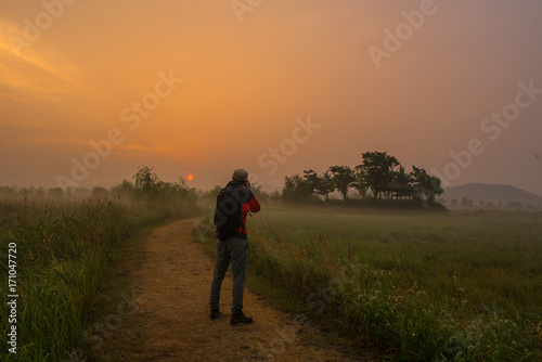 Tourists are taking pictures of the sun in the morning at Sora. South Korea © Mr.wijit amkapet