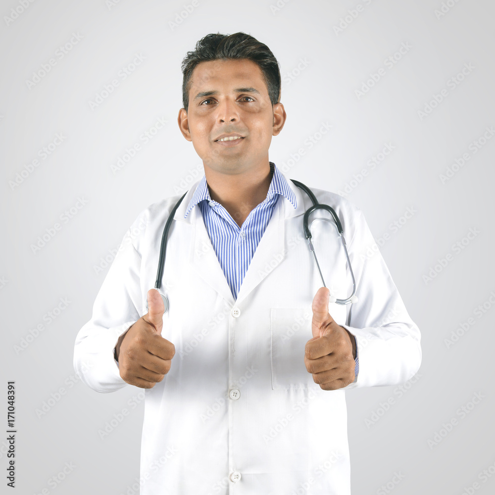Doctor with stethoscope thumbs up on congratulations Doctor with stethoscope thumbs up on congratulations