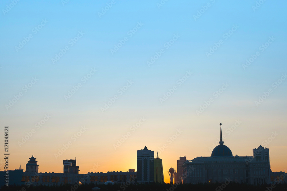 The silhouette of the city of Astana in the evening. Sunset in the capital of Kazakhstan.