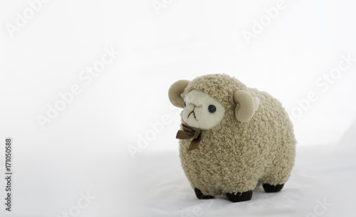 Brown sheep doll On a white background