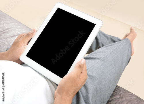 Man holding tablet pc in the office
