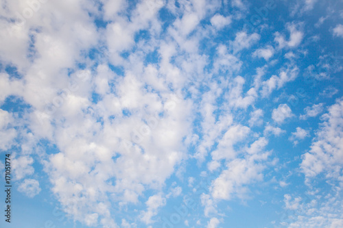 Sky and clouds. Clouds are rushing on a blue sky background. © freedarts