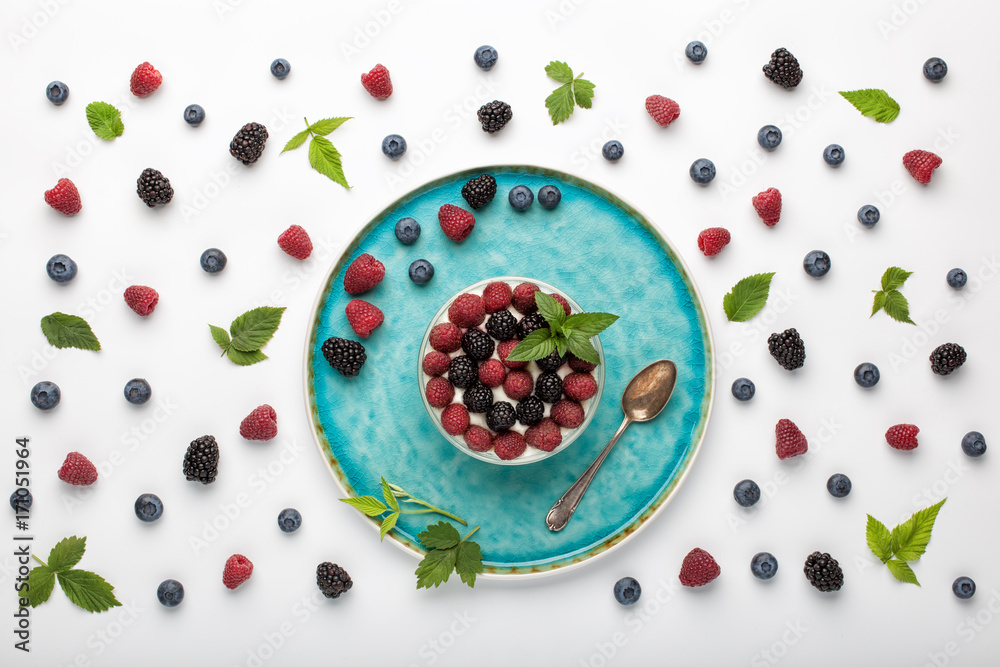Healthy breakfast with yogurt and berries. Top view, flat lay Healthy breakfast with yogurt and berries. Top view, flat lay
