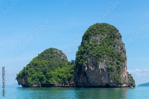 Limestone mountain with blue sky at Phra Nang cave beach
