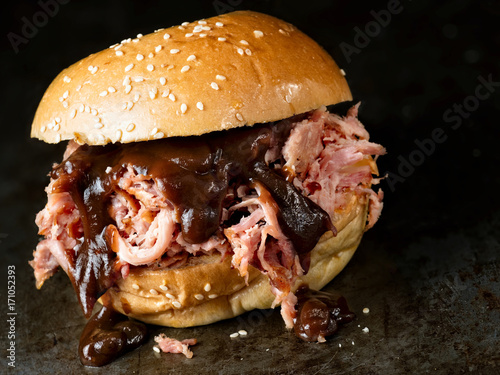 rustic american barbecued pulled pork sandwich