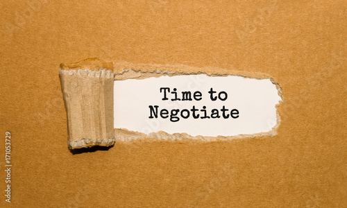 Bilde på lerret The text Time to negotiate appearing behind torn brown paper