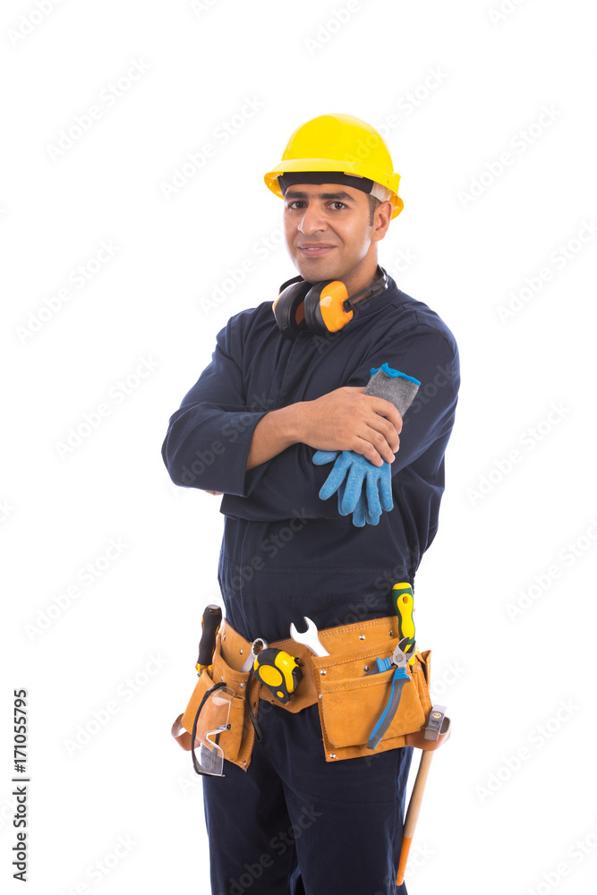 Happy beard worker smiling, guy wearing dark blue workwear and belt equipment with yellow helmet, isolated on white background Happy beard worker smiling, guy wearing dark blue workwear and belt equipment with yellow helmet, isolated on white background