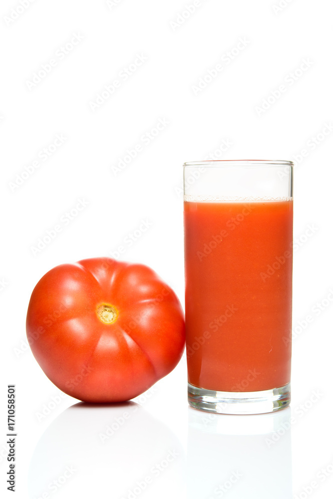 Glass of tomato juice with tomato fruit isolated on white background Glass of tomato juice with tomato fruit isolated on white background