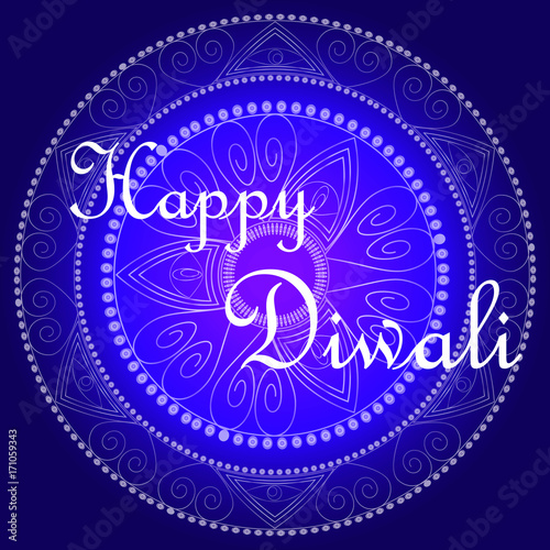 Happy Diwali. The inscription on a blue background, highlighted by a mandala. photo