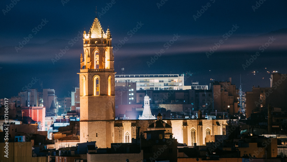 Bell tower of the church of Reus, Prioral de Sant Pere, city of Catalonia, Spain at night