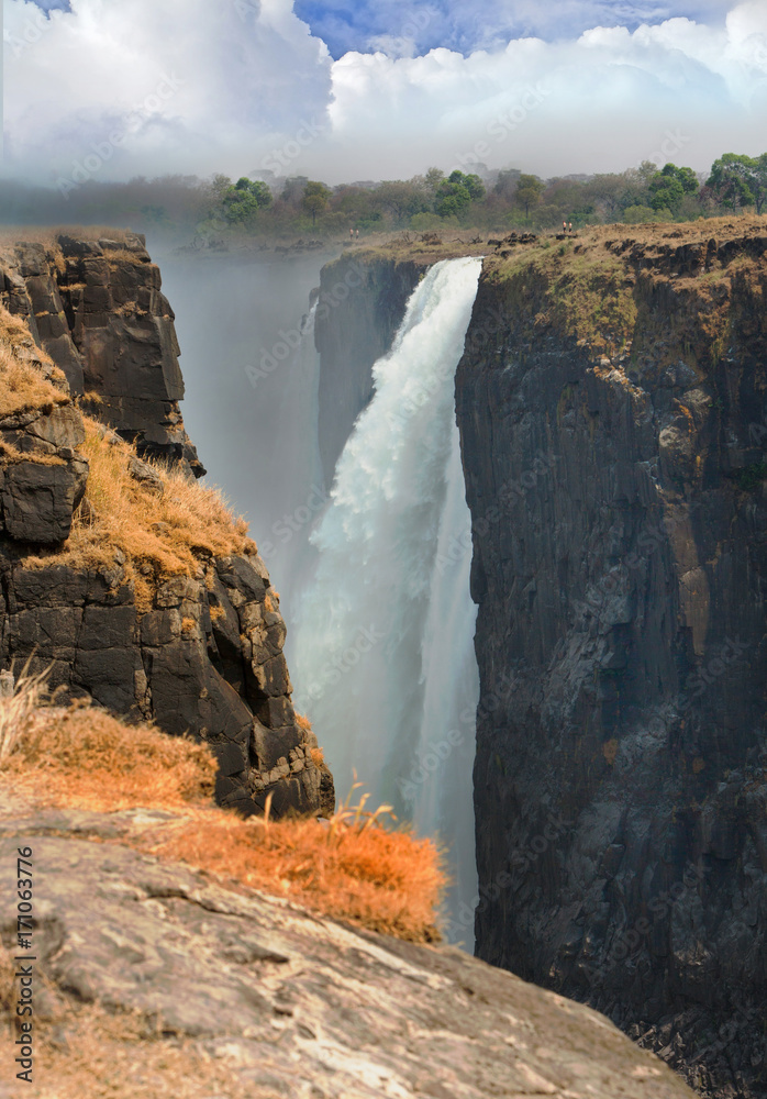 Victoria Falls cascading down the rocky gorge in Zimbabwe